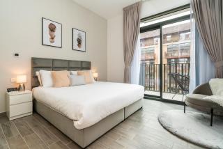 Sleek & Modern 1BR with Luxury Pool in JVC - 7