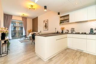 Sleek & Modern 1BR with Luxury Pool in JVC - 3