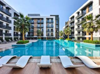 Sleek & Modern 1BR with Luxury Pool in JVC - 6