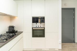 Sleek & Modern 1BR with Luxury Pool in JVC - 1