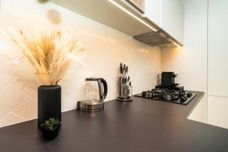 Sleek & Modern 1BR with Luxury Pool in JVC - 2