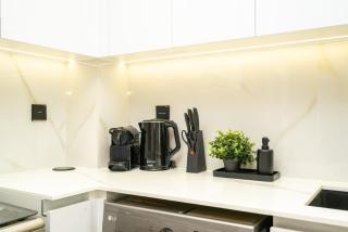 Luxury 1BR Apartment in JVC with Stunning Pool - 8