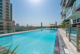 Luxury 1BR Apartment in JVC with Stunning Pool - 6