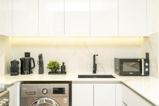 Luxury 1BR Apartment in JVC with Stunning Pool - 4