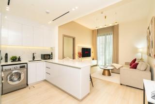 Luxury 1BR Apartment in JVC with Stunning Pool - 3