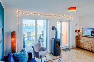 Ferienhaus-Am-Meer-by-Seeblick-Ferien-ORO-direkte-Wasserlage-Sauna-Kamin - 9