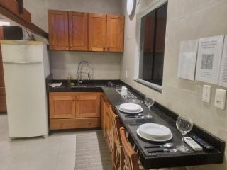 07 Mini casa próximo da praia com ar e garagem - 0