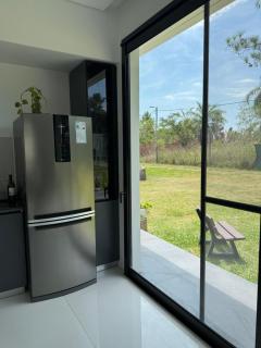 Casa con Piscina sobre Laguna Brava - Tranquilidad y Naturaleza en Barrio Privado - 1