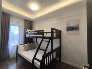 Comfy and Modernly Decorated 2 Bedroom Unit with free Parking - 5