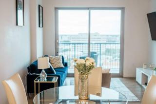 High-Rise Apartment with Panoramic Skyline Views - 5
