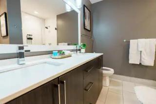 High-Rise Apartment with Panoramic Skyline Views - 4