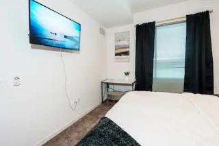 High-Rise Apartment with Panoramic Skyline Views - 3