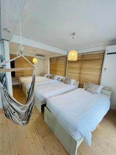 Stay in the Blue Zone of Okinawa! Ideal for World Heritage Forest, Junglia, Aquarium, Kourijima, and Sports Training - 0