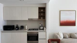 Magnificent - A Charming 2BR with a Burj Khalifa View - 1