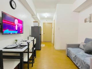 Cozy 1BR with Sofabed and Wifi in Grace Res - Manila - 2