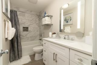 Rear deck w/ Soaking tub + Wi-Fi & Parking - 5