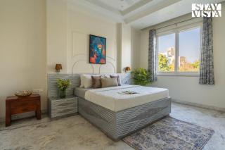 StayVista at Golfwood Manor with Terrace, BBQ, WiFi - Noida - 5