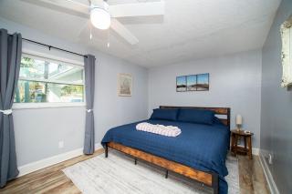 Waterfront Getaway with Heated Pool & Hot Tub - 1