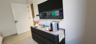 استوديو أنيق ودافئ بمدخل ذكي بالقرب من شارع تجاري حيوي - 5