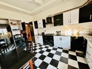 Haven Lodge - 3BR Luxury Home in AWT Lahore - Lahore - 2