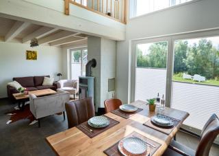 Pier 84 - tolles Ferienhaus für bis zu 4 Personen mit Kaminofen und Sauna - Haustiere herzlich willkommen, direkt am Wasser gelegen - Nordhorn - 2
