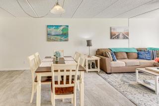 Coastal Condo Escape with Patio Steps to Beach - 4
