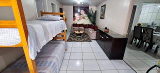 CASA TOP de 2 quartos em TORRES-RS - na mais bela praia Gaúcha - Cozinha - Banheiro - Ar-condicionado split em cada quarto- Smart TV 32' - Wi-Fi- Estacionamento - Anfitriã Superhost no BnB - 3