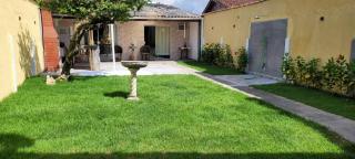Casa espaçosa familiar com lindo jardim - Praia Grande - 0