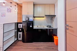 Best Choice and Restful 2BR Vida View Makassar Apartment By Travelio - Pampang - 8