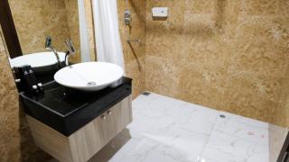 Nice and Relax 1BR at Grand Sungkono Lagoon Apartment By Travelio - Surabaya - 1
