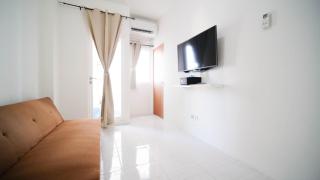 Cozy Living and Tidy 2BR at Puncak Dharmahusada Apartment By Travelio - 6