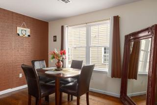Newark Gem Pearl 3BR, 2BA - Sleeps 8 - Walk to Prudential Center and Newark Penn Station, Near EWR and American Dream Mall, includes WiFi - Laundry - Backyard - Gym - Newark - 3