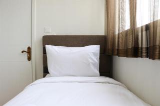 Homey and Comfort Living 2BR at Daan Mogot City Apartment By Travelio - Jakarta - 6