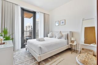 Stylish 1BR with Pool, Gym, BBQ Area & Playground - 9