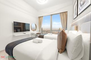 SML Vacation Homes - Sky High Apartments with Burj Khalifa and Dubai Fountain Views at Grande Signature, Downtown Dubai - 4
