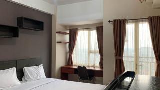 Comfort and Homey Studio at Margonda Residence 5 Apartment By Travelio - 2