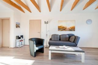 Ferienwohnung Seestern mit Rundbogenfenster am Badesee Tannenhausen - Aurich - 4