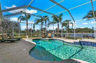 Luxe Waterfront Hideaway w Pool Pirate Ship Dock - 3