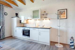 Ferienwohnung Ebbe mit Loggia und schönem Ausblick am Badesee Tannenhausen - Aurich - 7