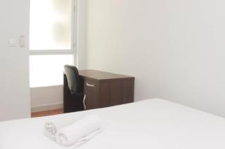 Homey and Minimalist 2BR at Patraland Urbano Apartment By Travelio - Bekasi - 5