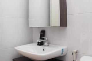 Homey and Minimalist 2BR at Patraland Urbano Apartment By Travelio - 2