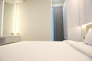 Exclusive and Spacious 2BR Apartment at Supermall Mansion Surabaya By Travelio - Surabaya - 1