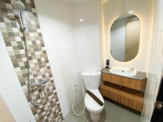 Cozy and Tidy 1BR The Alton Apartment By Travelio - Semarang - 2