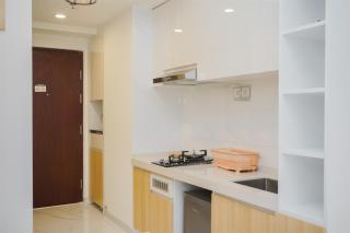 Cozy Studio Room at Sky House BSD Apartment By Travelio - 7