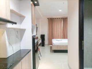 Elegant and Comfortable Studio Patraland Amarta Apartment By Travelio - 1