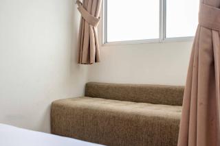 Simple and Comfort Studio at Riverview Jababeka Apartment By Travelio - 3