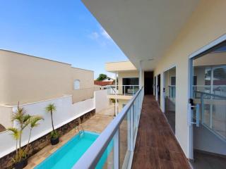 Suítes com piscina a 2 quadras da Praia da Enseada - 1