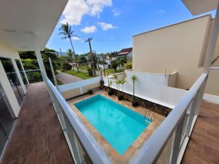 Suítes com piscina a 2 quadras da Praia da Enseada - 8