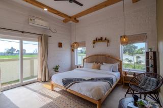 SaffronStays Sher Bagh - 4BR eco-friendly pool villa with jungle trails, farm-to-table meals & bonfire nights near Corbett Park - 1