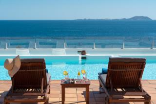 Villa Volcán con piscina e impresionantes vistas al mar, pádel y mini golf en Montaña Roja - Playa Blanca - 9
